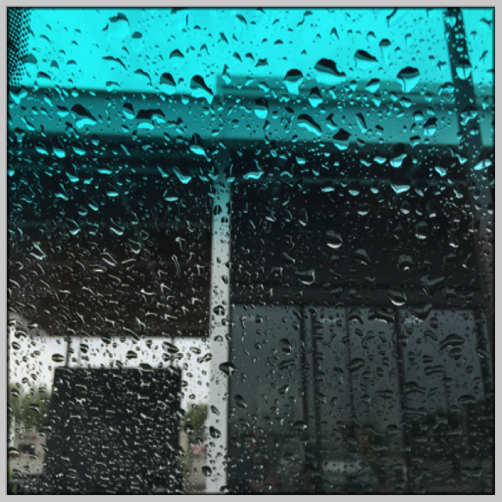 Raindrops on our windshield from the first Hurricane Rosa.